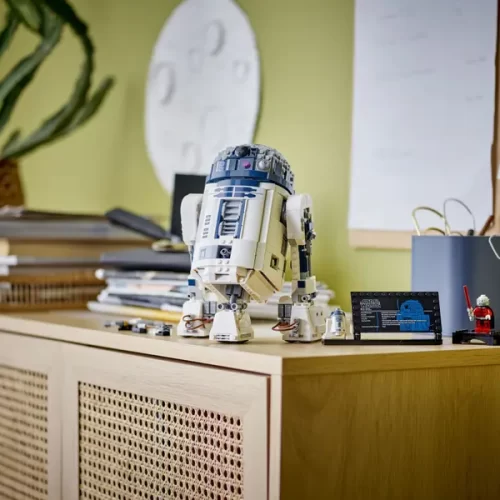 Lego Star Wars R2-D2 atop shelving unit