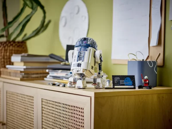 Lego Star Wars R2-D2 atop shelving unit