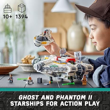 Child playing with Lego Star Wars Ghost & Phantom II set.