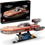Lego Star Wars Luke Skywalker's Landspeeder set displayed next to box.