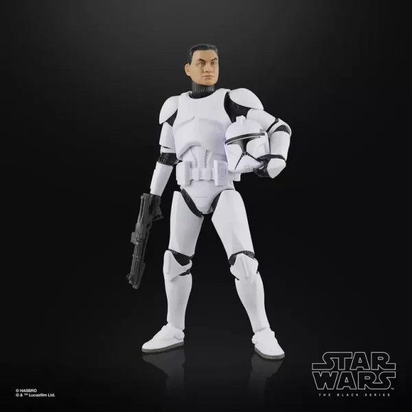 Hasbro Star Wars The Black Series Phase I Clone Trooper with blaster pistol in one hand and helmet in the other